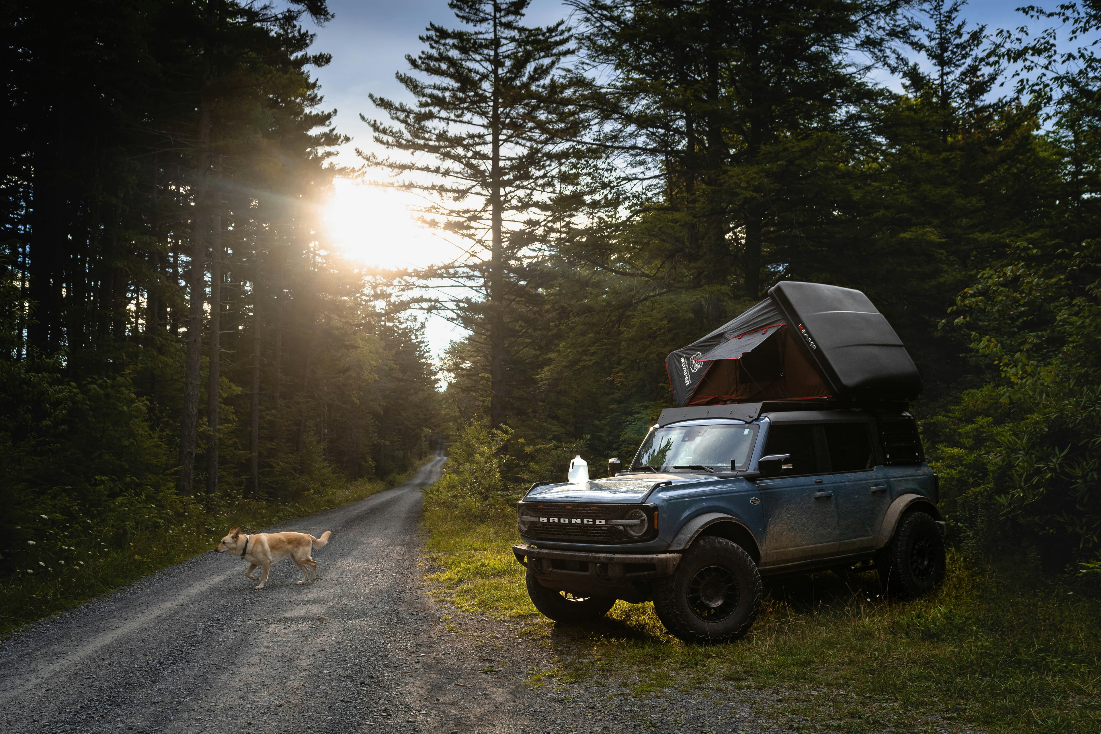 Overlanding vehicle on mountain trail